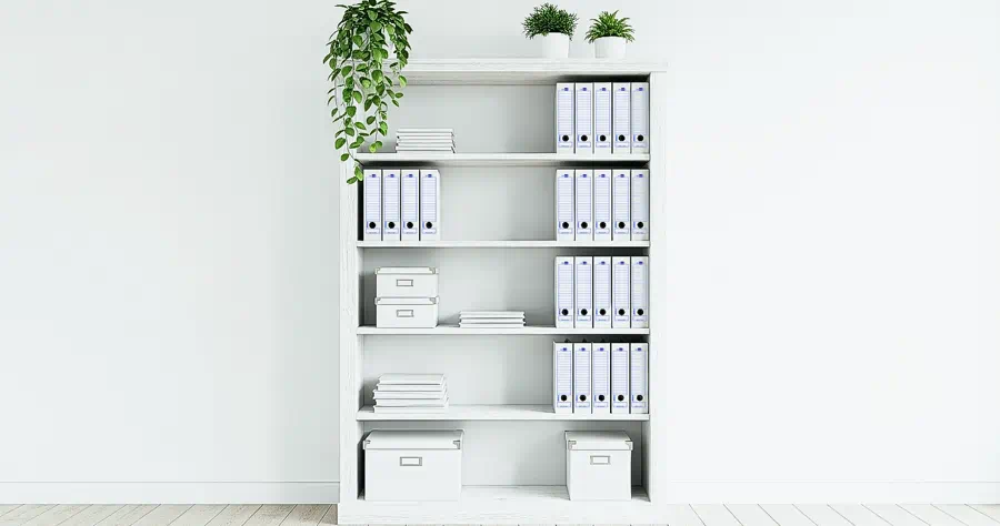 Archivos definitivos de Papeleris en mueble de oficina.